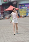 牛仔短裤美女肉丝高跟